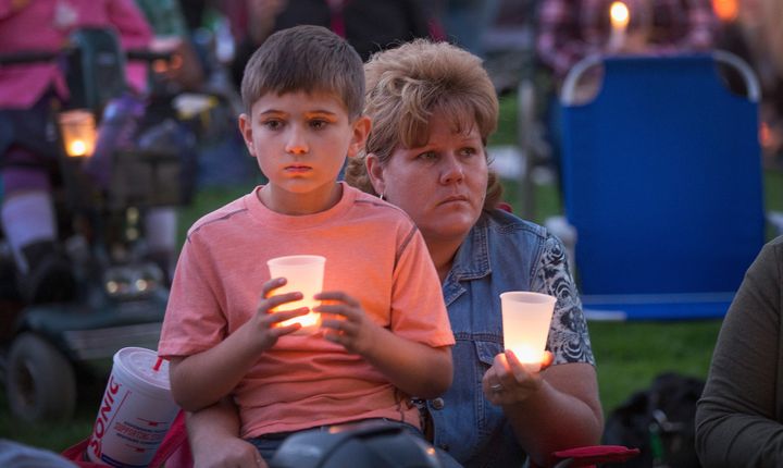 Mourners at a vigil for the victims of the October 1 Umpqua Community College massacre. The mass shooting in Roseburg, Oregon is the latest incident fueling a national debate over gun control.