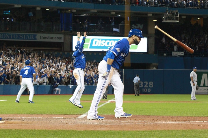 Oakland A's mascot taunts Jose Bautista with triumphant bat-flip