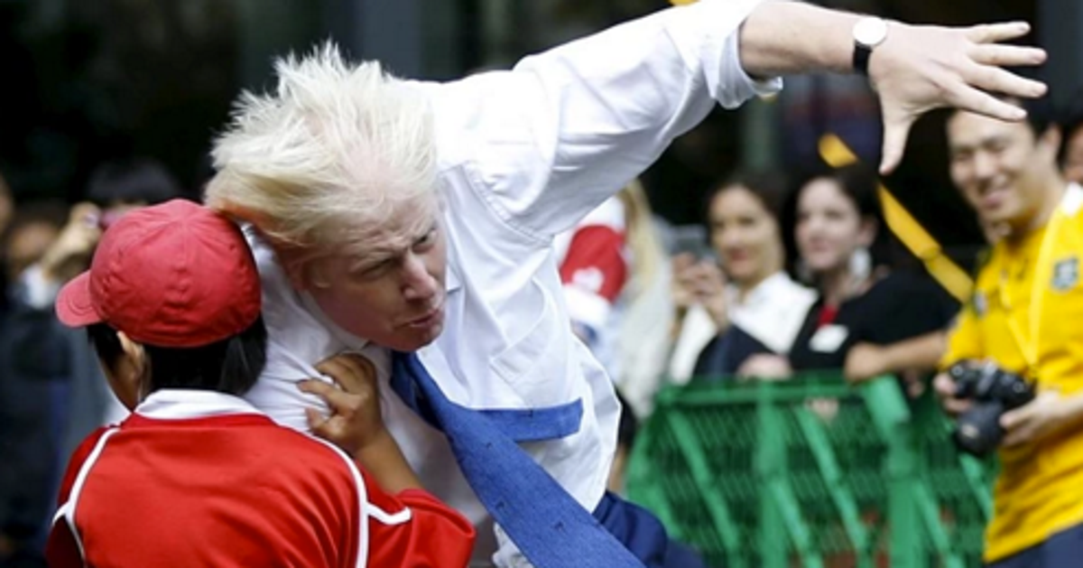 London Mayor Boris Johnson Bodyslams Boy During Rugby Match HuffPost