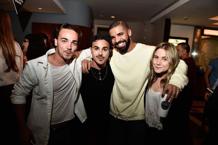 Drake (3rd from L) poses with his former 'Degrassi' co-stars Daniel Clark, Adamo Ruggiero and Lauren Collins