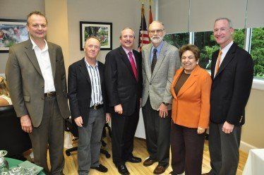 Colin McGinn, second from left, poses with faculty and then-University of Miami President Donna Shalala. The photo was distributed in a 2010 press release noting faculty who won the 2009-2010 Provost’s Award for Scholarly Activity. 