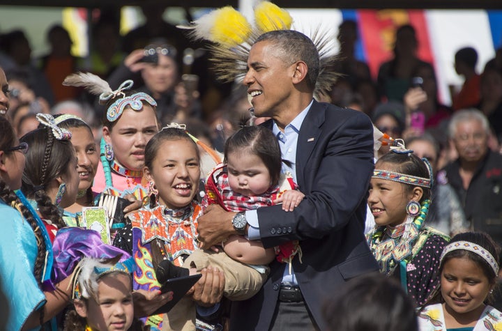 President Barack Obama greets Native American children in Cannon Ball, North Dakota, on June 13, 2014. The U.S. Department of