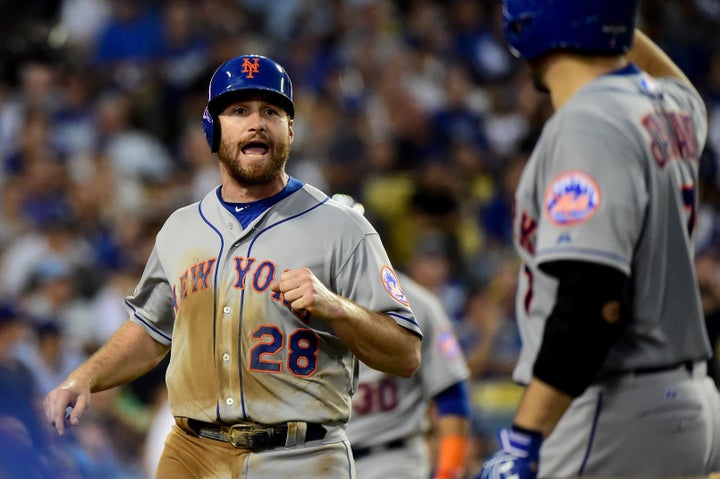 Daniel Murphy is thrilled after scoring in the fourth inning.