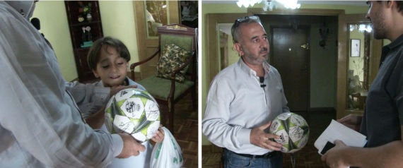 Abdul Mohsen and his son Zaid play with a ball signed by Real Madrid players.