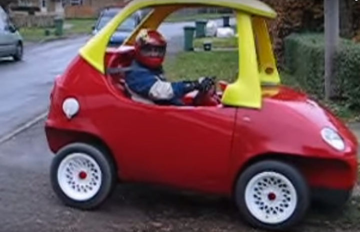 this super-narrow electric car looks like an odd adult-sized toy