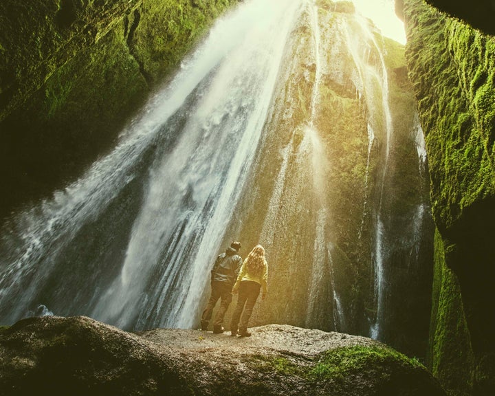 The couple at Gljufrabui Waterfall in Iceland.