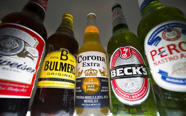 Bottles of beer and cider produced by Anheuser-Busch InBev and SABMiller.