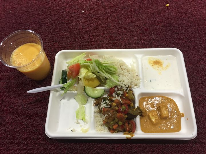 The langar meal included two types of curries, rice, raita (a side dish made from yogurt), salad, naan (an Indian flatbread) and mango lassi.