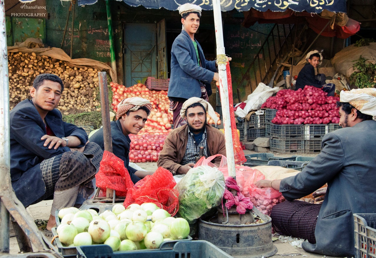 At a market on May 25, 2015. "Print our photo and bring it with you the next time," the men say.