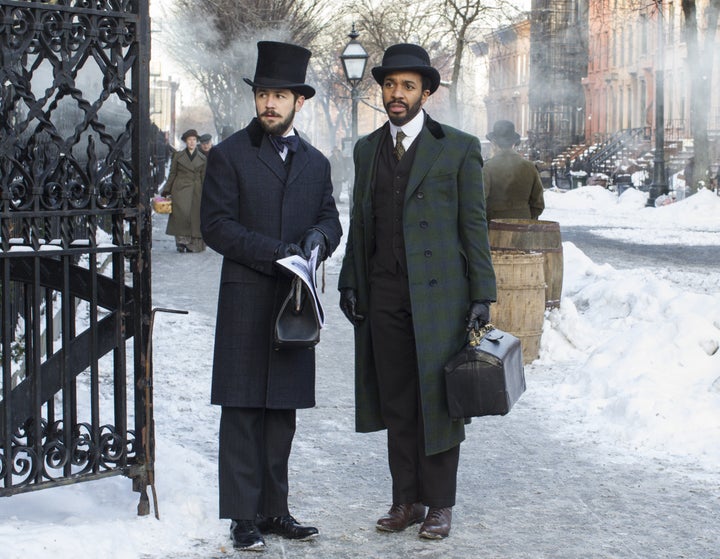 Michael Angarano stars with André Holland in a scene from Season 2 of "The Knick."