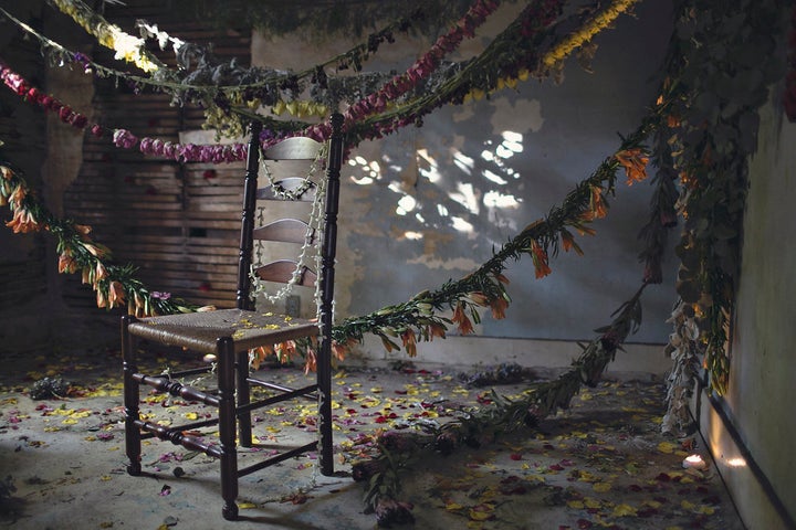 A scene from Flower House, a floral installation in an abandoned house in Detroit.