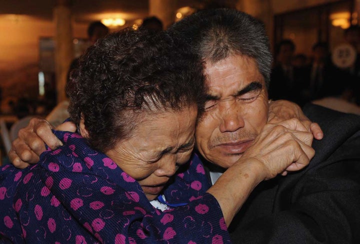 Relatives cry as they bid farewell to each other at a family reunion event in North Korea in 2009.