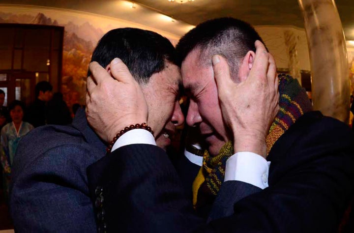 South Korean Park Yang-gon, left, meets his North Korean brother Park Yang-soo during a 2014 family reunion event in North Korea. The brothers had been separated for more than 60 years.