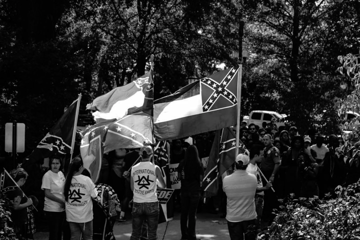 Members of pro-segregationist and white supremacist groups protested at Ole Miss after students held a rally to take down the Mississippi state flag on campus.