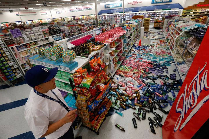 BREA, CA, FRIDAY, MARCH 28, 2014 - Cesar Zamora, night manager at the 99 Cent Only store located on Imperial Highway looks over aisles of fallen goods shaken off the shelves thanks to a 5.1 magnitude earthquake centered nearby in La Habra.