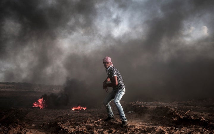 A Palestinian protester is seen during a demonstration against Israeli Government's violations at Al-Aqsa Mosque, on October
