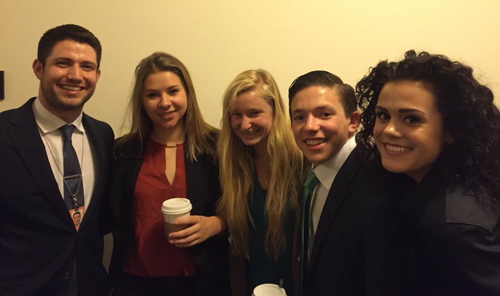 Steven Arango, left, was first in line for Thursday's hearing. Eddie Neret, second from right, joined him along with other Capitol Hill interns.