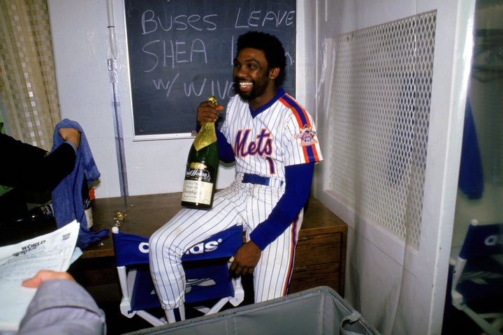 Mookie Wilson celebrating after the Mets beat the Red Sox in the 1986 World Series