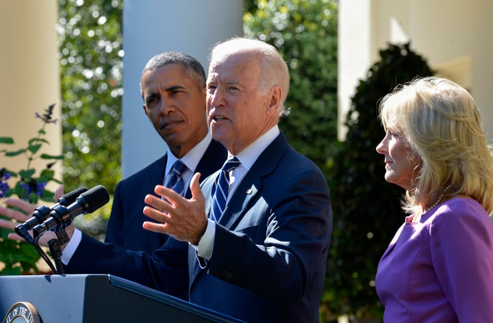 Vice President Joe Biden, center, speaks in the Rose Garden of the White House with his wife, Jill Biden, and President Barack Obama in Washington, D.C., Oct. 21, 2015. Biden won't seek the Democratic presidential nomination in 2016, a decision that most Democrats in a HuffPost/YouGov survey say they support.