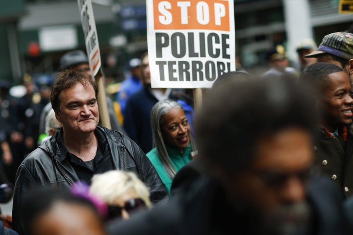 Quentin Tarantino takes part in a march against police brutality in New York. 