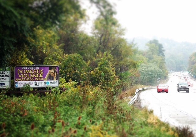 A billboard promoting domestic violence services in Washington County, Pennsylvania.