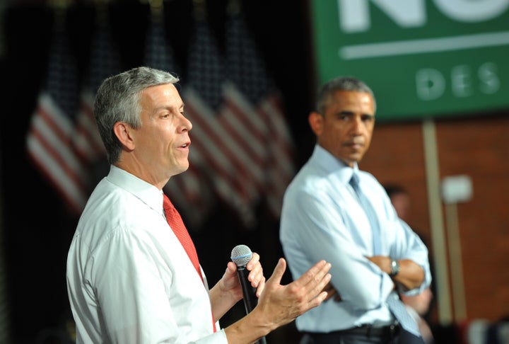 Outgoing Secretary of Education Arne Duncan speaks alongside President Barack Obama at a town hall style meeting at North High School on Sept 14 in Des Moines, Iowa. Obama discussed changes to the federal student loan process that he said would make college more affordable and accessible for students and their families.