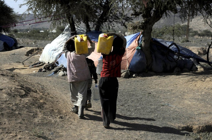 Families fleeing their homes in Saada, Yemen, due to air operations by the Saudi-led coalition live in makeshift tents near the city of Amran, Yemen.