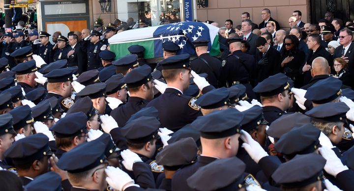 Pallbearers carry the casket at the Dec. 27, 2014, funeral of Officer Rafael Ramos, one of two police officers murdered while sitting in their patrol car in Brooklyn.