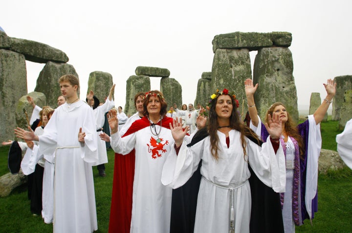 Druids perform a Samhain or pagan Halloween style blessing ceremony at Stonehenge in Wiltshire.