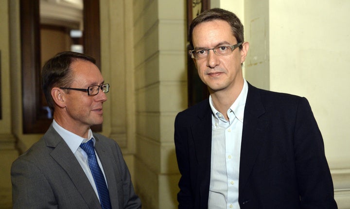 Chris Meganck and Eric Roux of Scientology Belgium and Europe are pictured during the first session of a trial against Scientology Europe in Brussels court on Oct. 26, 2015.