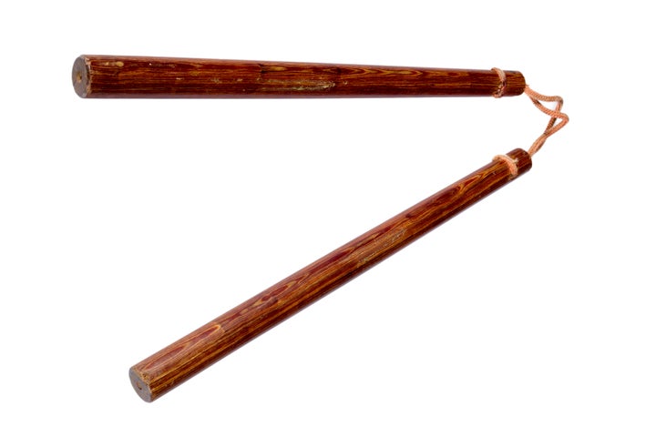 A pair of wooden nunchucks. 