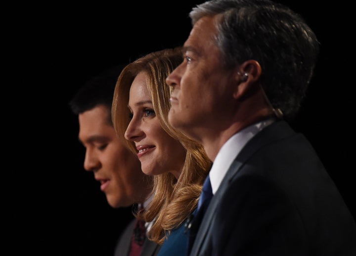 CNBC debate moderators Carl Quintanilla, Becky Quick and John Harwood