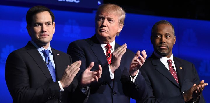 Republican presidential hopefuls (L-R) Marco Rubio, Donald Trump and Ben Carson applaud as the candidates are introduced at the start of the third GOP presidential debate on Wednesday. The social media app Yik Yak set up a special forum for the debate.