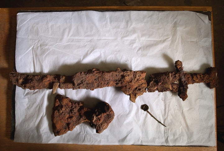 A sword was one of the most important weapons of a Viking warrior. In this photo, a Viking sword, axe head and ring pin are displayed on Oct. 18, 2011, in Edinburgh, Scotland.