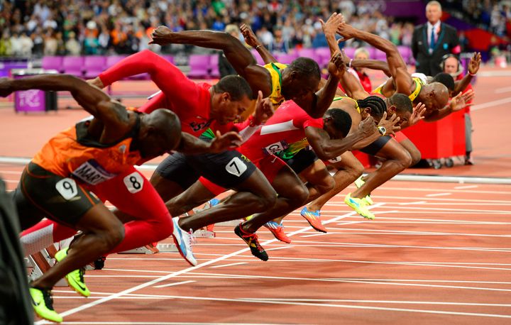 Runners at the starting line of the 2012 London Olympic Games 100-meter dash. A study found a time gap between ‘ready’ and ‘start’ can affect the outcome of a race.