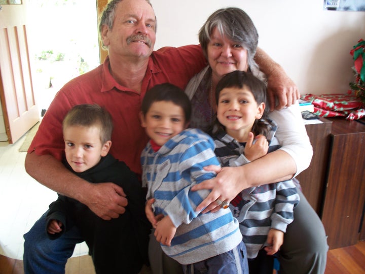 Caitlin, her husband Rob and their grandchildren.