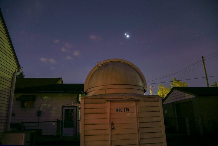 Venus shines the brightest of the three planets while it clusters close to Jupiter. Mars hangs faintly off to the s