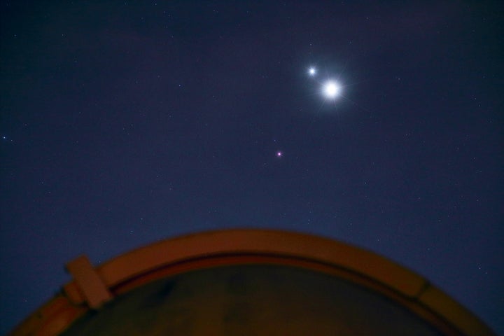 Jupiter and Venus shine close to each other, and Mars remains visible and apart from them.