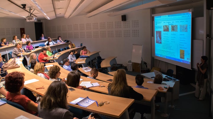 Evgenia Cherkasova presents the Meaning of Life course and website to faculty as a keynote speaker at the Student Symposium at The American College of Greece in Athens, Greece.