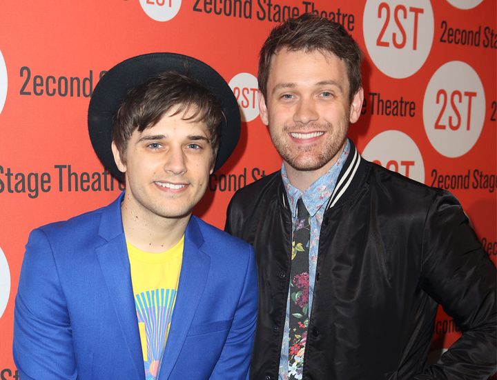 With fiancé Andy Mientus (left). 