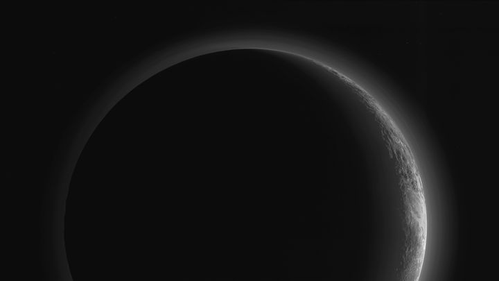 This image was taken just 15 minutes after New Horizons' closest approach to Pluto on July 14, 2015, as the spacecraft looked back at the dwarf planet, toward the sun.