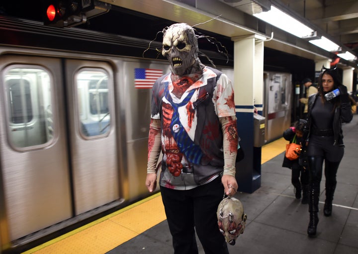 In New York City, zombies roam the subways on Halloween.