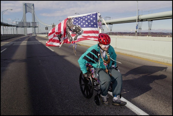 A New York City Marathon participant crosses the famed Verrazano-Narrows Bridge.