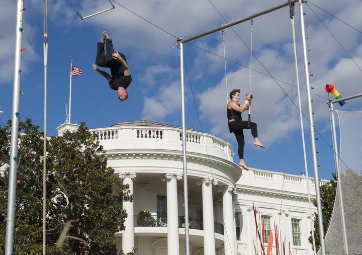 Trapeze acrobats ready to entertain the 4,200 expected guests.