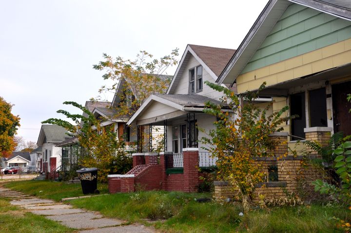 Jonathan Spikes, who unsuccessfully bid on the home he rents in Detroit, says there are more vacant homes on his block than occupied ones. Activists criticize the foreclosure auction for leading to vacancy and displacing residents.