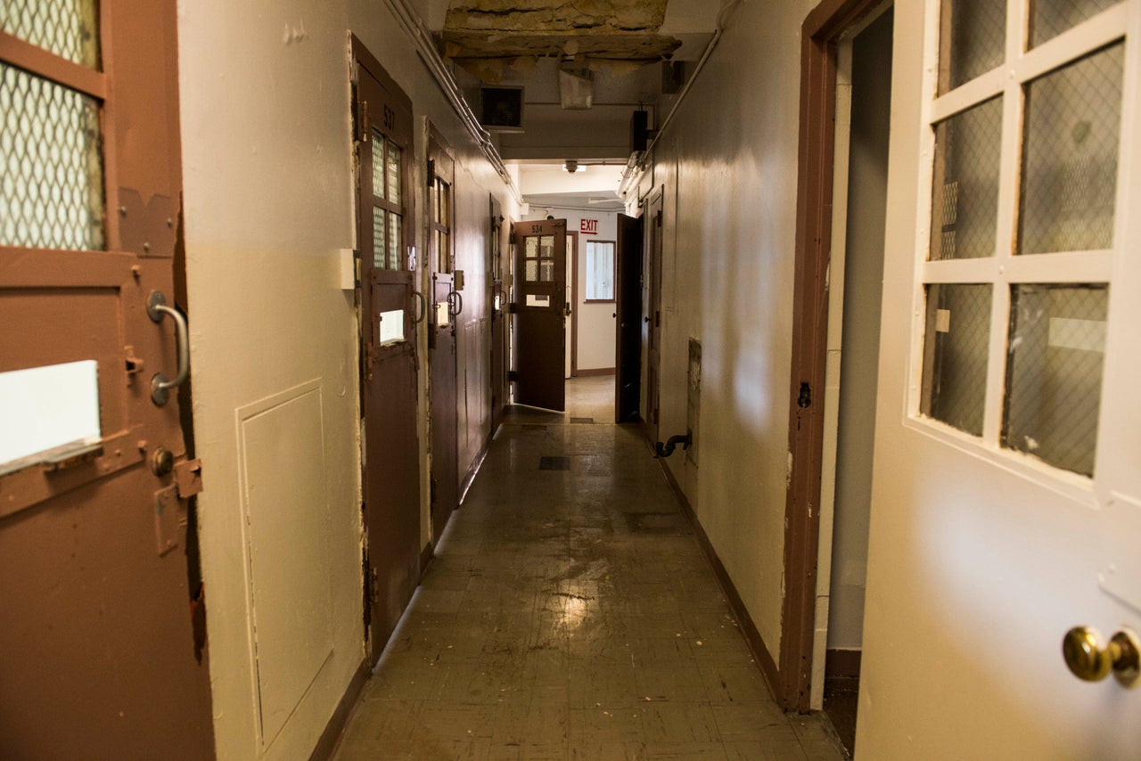 A row of solitary confinement cells. 