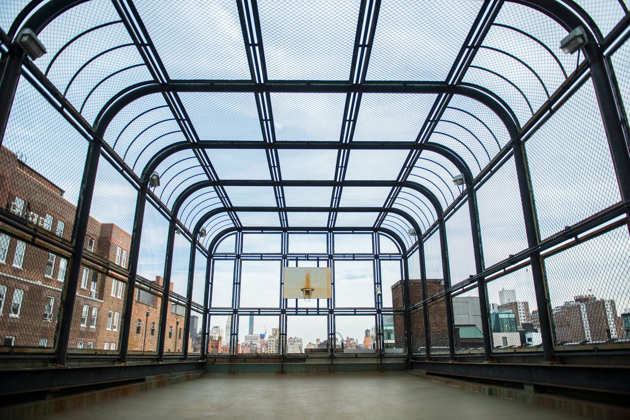 A basketball court on top of the building, from which incarcerated women could see the hustle and bustle of the city below them.
