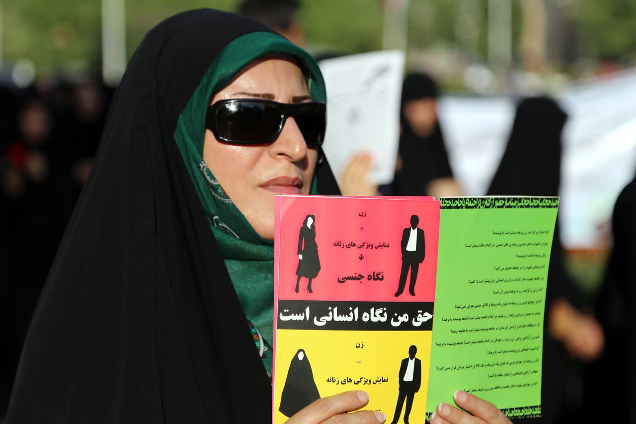 A woman protests hijab law on Hijab and Chastity National Day in Mashhad, Iran on July 12, 2014.