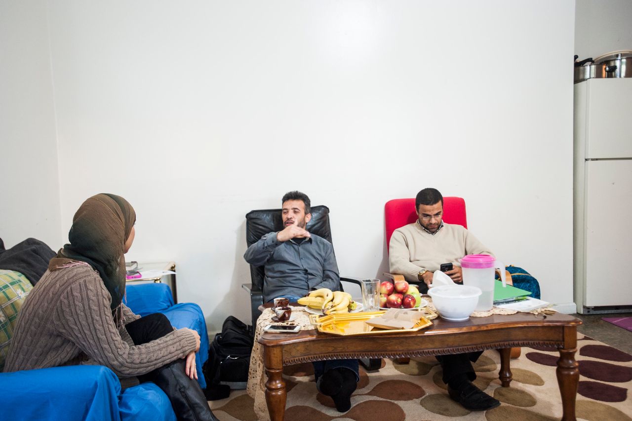 Mohamed Darbi, left, has had trouble acclimating to life in New Jersey. Mahmoud Mahmoud, right, is the Jersey City Director of the Church World Service, one of nine U.S. refugee resettlement agencies. He has helped the Darbi family settle and is currently trying to find a job for Mohamed.