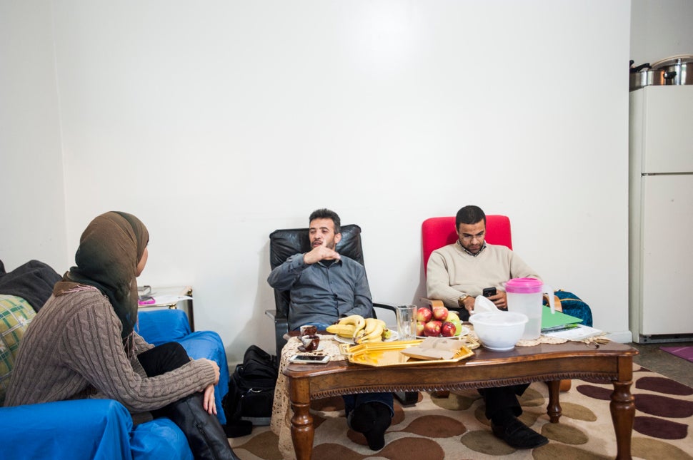 Mohamed Darbi, left, has had trouble acclimating to life in New Jersey. Mahmoud Mahmoud, right, is the Jersey City Director o